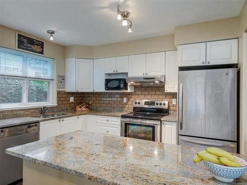 103-1663 Mckenzie Ave, Saanich, BC - Indoor Photo Showing Kitchen With Double Sink