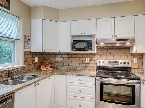 103-1663 Mckenzie Ave, Saanich, BC - Indoor Photo Showing Kitchen With Double Sink