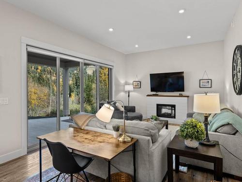 2424 Fairways Drive, Sun Peaks, BC - Indoor Photo Showing Living Room With Fireplace