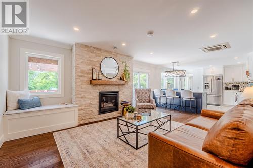 54 Middle Bight Road, Conception Bay South, NL - Indoor Photo Showing Living Room With Fireplace