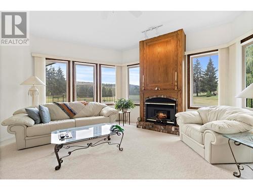 2645 Golf View Place, Blind Bay, BC - Indoor Photo Showing Living Room With Fireplace