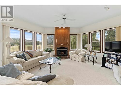 2645 Golf View Place, Blind Bay, BC - Indoor Photo Showing Living Room With Fireplace