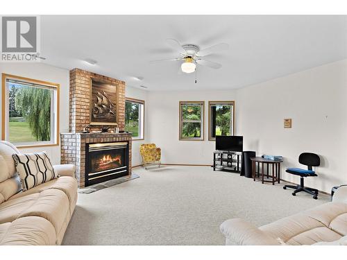 2645 Golf View Place, Blind Bay, BC - Indoor Photo Showing Living Room With Fireplace