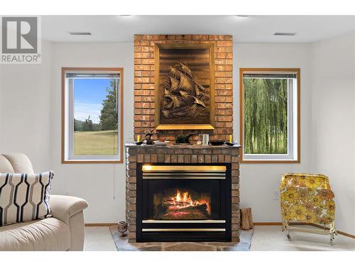 2645 Golf View Place, Blind Bay, BC - Indoor Photo Showing Living Room With Fireplace