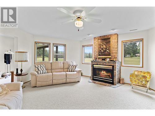 2645 Golf View Place, Blind Bay, BC - Indoor Photo Showing Living Room With Fireplace