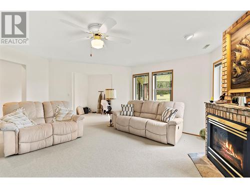 2645 Golf View Place, Blind Bay, BC - Indoor Photo Showing Living Room With Fireplace