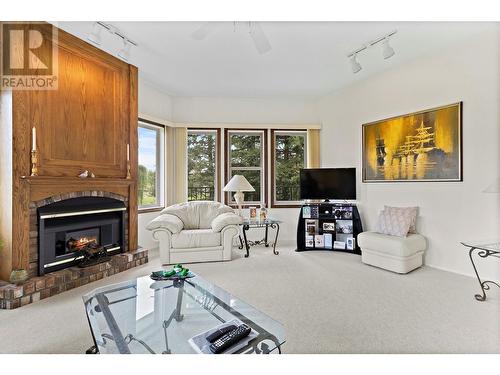 2645 Golf View Place, Blind Bay, BC - Indoor Photo Showing Living Room With Fireplace