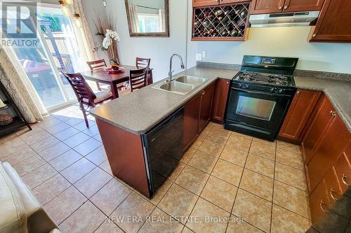 3 Hartland Road, Hamilton (Stoney Creek), ON - Indoor Photo Showing Kitchen With Double Sink