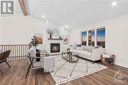 209 Trudeau Crescent, Russell, ON - Indoor Photo Showing Living Room With Fireplace