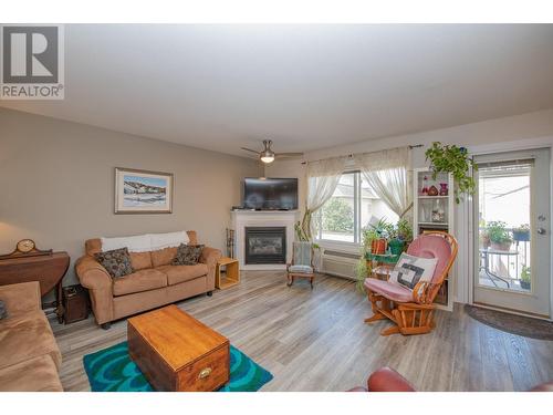 4740 20 Street Unit# 88, Vernon, BC - Indoor Photo Showing Living Room With Fireplace