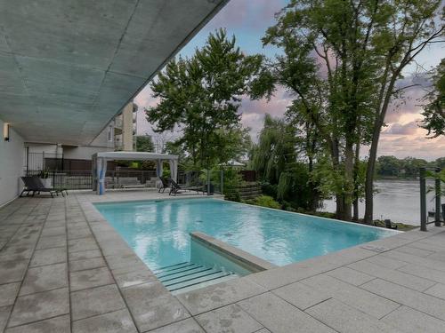 Pool - 801-510 Boul. Des Prairies, Laval (Laval-Des-Rapides), QC - Outdoor With In Ground Pool