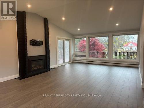 4504 East Road, Central Elgin (Port Stanley), ON - Indoor Photo Showing Living Room With Fireplace