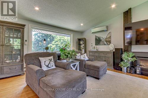 4504 East Road, Central Elgin (Port Stanley), ON - Indoor Photo Showing Living Room With Fireplace