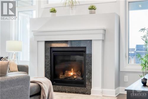 734 Meadowridge Circle, Ottawa, ON - Indoor Photo Showing Living Room With Fireplace