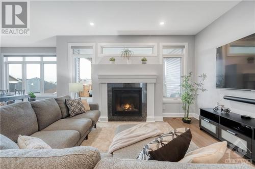 734 Meadowridge Circle, Ottawa, ON - Indoor Photo Showing Living Room With Fireplace