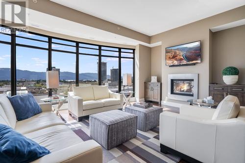 1395 Ellis Street Unit# 902, Kelowna, BC - Indoor Photo Showing Living Room With Fireplace