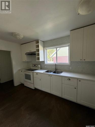 1672 97Th Street, North Battleford, SK - Indoor Photo Showing Kitchen With Double Sink