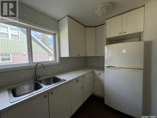 1672 97Th Street, North Battleford, SK - Indoor Photo Showing Kitchen With Double Sink