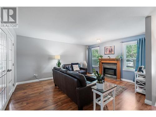 284 Drysdale Boulevard, Kelowna, BC - Indoor Photo Showing Living Room With Fireplace