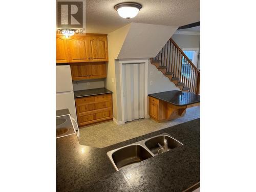 4004 3 Highway, Erickson, BC - Indoor Photo Showing Kitchen With Double Sink