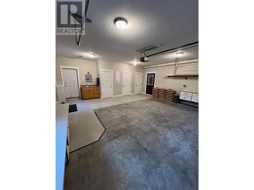 4004 3 Highway, Erickson, BC - Indoor Photo Showing Garage