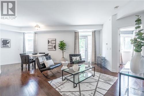 Access to the balcony through living room - 1201 Ohio Street Unit#203, Ottawa, ON - Indoor Photo Showing Living Room