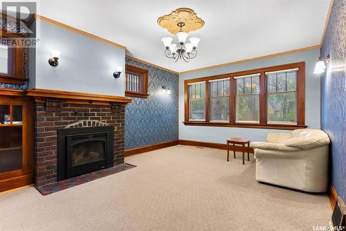 2028 Elphinstone Street, Regina, SK - Indoor Photo Showing Living Room With Fireplace