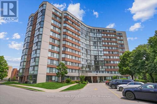 702 - 1230 Marlborough Court, Oakville, ON - Outdoor With Facade