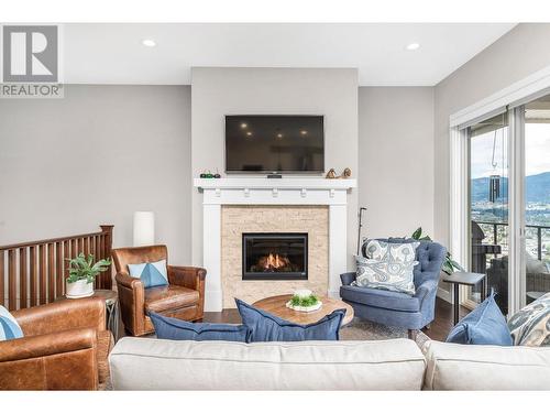 3812 Terrapin Place, Vernon, BC - Indoor Photo Showing Living Room With Fireplace