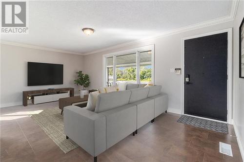 Living room - virtually staged - 840 Stewart Boulevard, Brockville, ON - Indoor Photo Showing Living Room