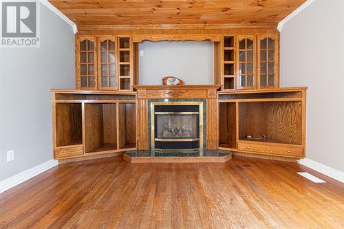 11 Church Road, New Harbour, NL - Indoor Photo Showing Other Room With Fireplace