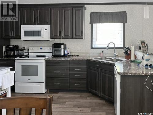 230 1St Street S, Christopher Lake, SK - Indoor Photo Showing Kitchen With Double Sink