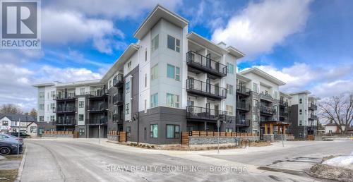 416 - 110 Fergus Avenue, Kitchener, ON - Outdoor With Facade