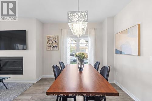 41 Starling Drive, Hamilton (Bruleville), ON - Indoor Photo Showing Dining Room With Fireplace