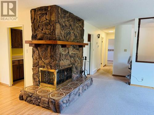 1015 N Eleventh Avenue, Williams Lake, BC - Indoor Photo Showing Living Room With Fireplace