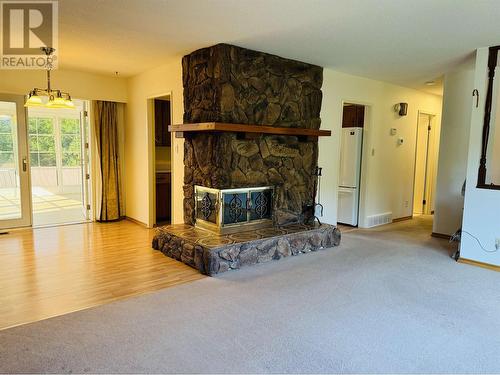 1015 N Eleventh Avenue, Williams Lake, BC - Indoor Photo Showing Living Room With Fireplace