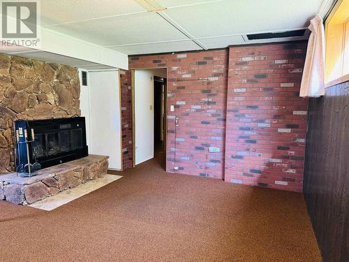 1015 N Eleventh Avenue, Williams Lake, BC - Indoor Photo Showing Other Room With Fireplace