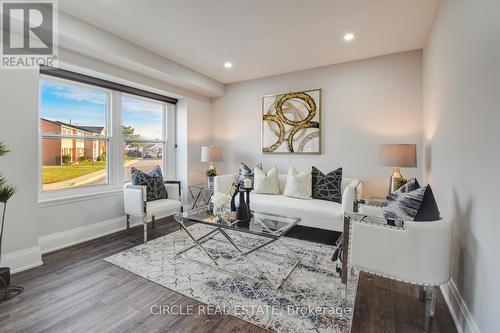 30 - 900 Central Park Drive, Brampton, ON - Indoor Photo Showing Living Room