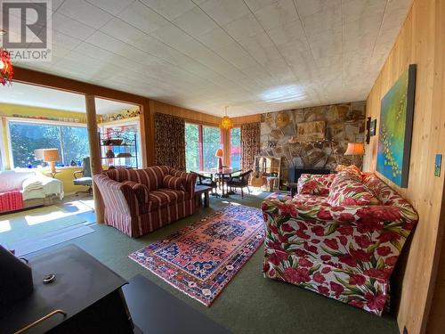 8712 Beach  Street, Balfour, BC - Indoor Photo Showing Living Room With Fireplace