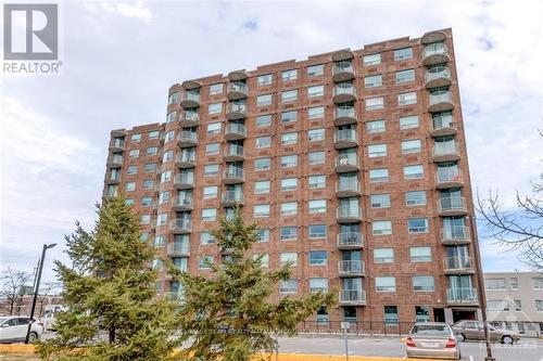 905 - 1440 Heron Road, Ottawa, ON - Outdoor With Balcony With Facade