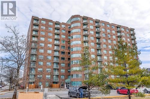 905 - 1440 Heron Road, Ottawa, ON - Outdoor With Balcony With Facade