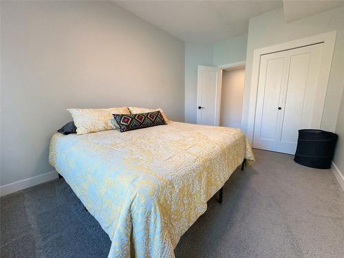 13980 Ponderosa Way, Coldstream, BC - Indoor Photo Showing Bedroom