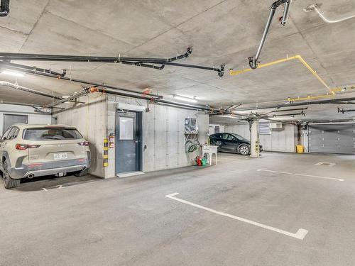 Parking - 202-1684 Rue De L'Estran, Lévis (Les Chutes-De-La-Chaudière-Ouest), QC - Indoor Photo Showing Garage