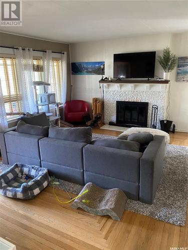 557 22Nd Street W, Prince Albert, SK - Indoor Photo Showing Living Room With Fireplace