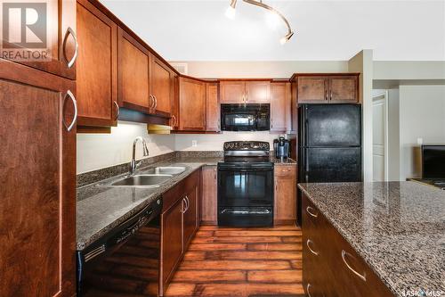 212 615 Lynd Crescent, Saskatoon, SK - Indoor Photo Showing Kitchen With Double Sink