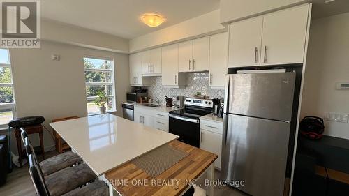 212 - 251 Northfield Drive E, Waterloo, ON - Indoor Photo Showing Kitchen With Stainless Steel Kitchen