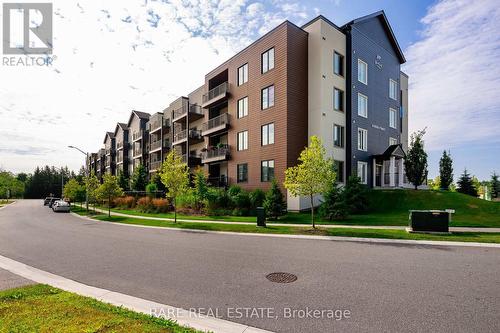 309 - 54 Koda Street, Barrie (Holly), ON - Outdoor With Facade