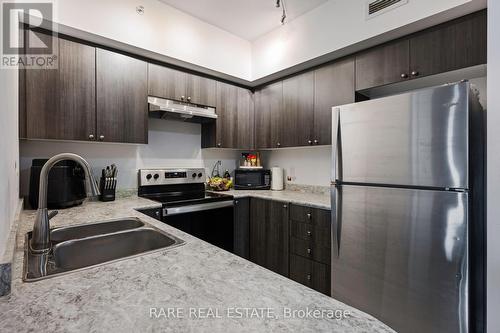 309 - 54 Koda Street, Barrie (Holly), ON - Indoor Photo Showing Kitchen With Double Sink