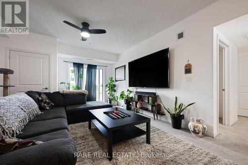 309 - 54 Koda Street, Barrie, ON - Indoor Photo Showing Living Room