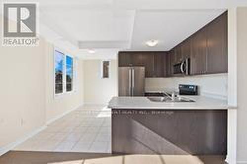 73 - 383 Dundas Street E, Hamilton (Waterdown), ON - Indoor Photo Showing Kitchen With Double Sink